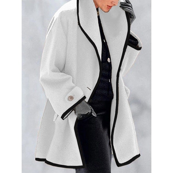 Stylish coat with contrasting piping