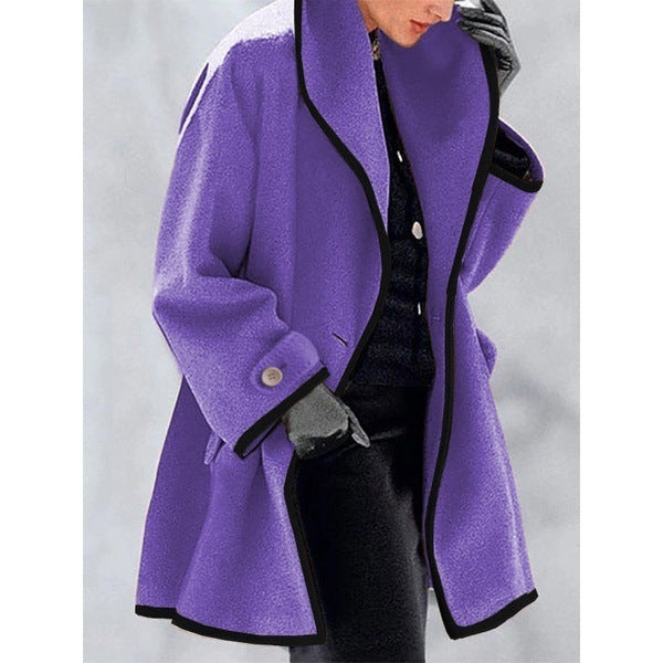 Stylish coat with contrasting piping
