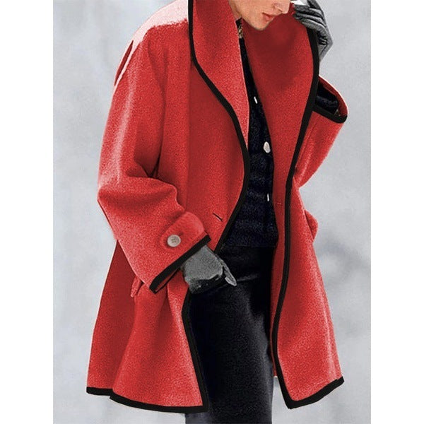 Stylish coat with contrasting piping