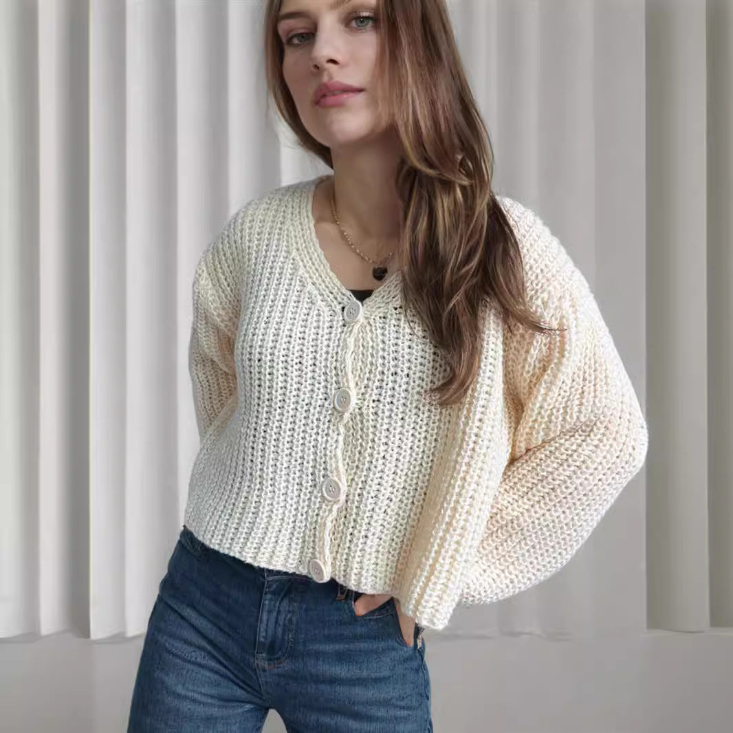 Damska bluza z grubego swetra z modnymi detalami guzików i luźnym krojem Eloura-Moda