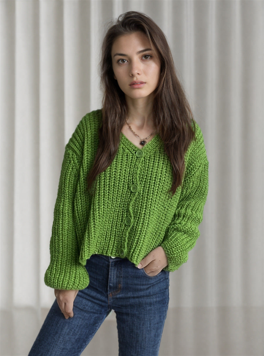 Damska bluza z grubego swetra z modnymi detalami guzików i luźnym krojem Eloura-Moda