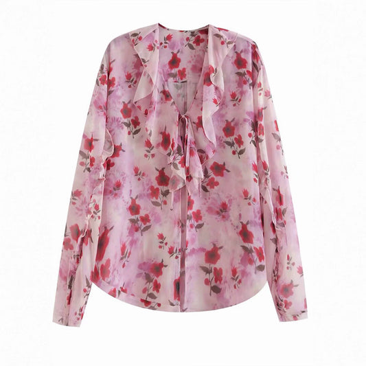 Damska bluzka z falbankowym designem i floralnym wzorem Eloura-Moda