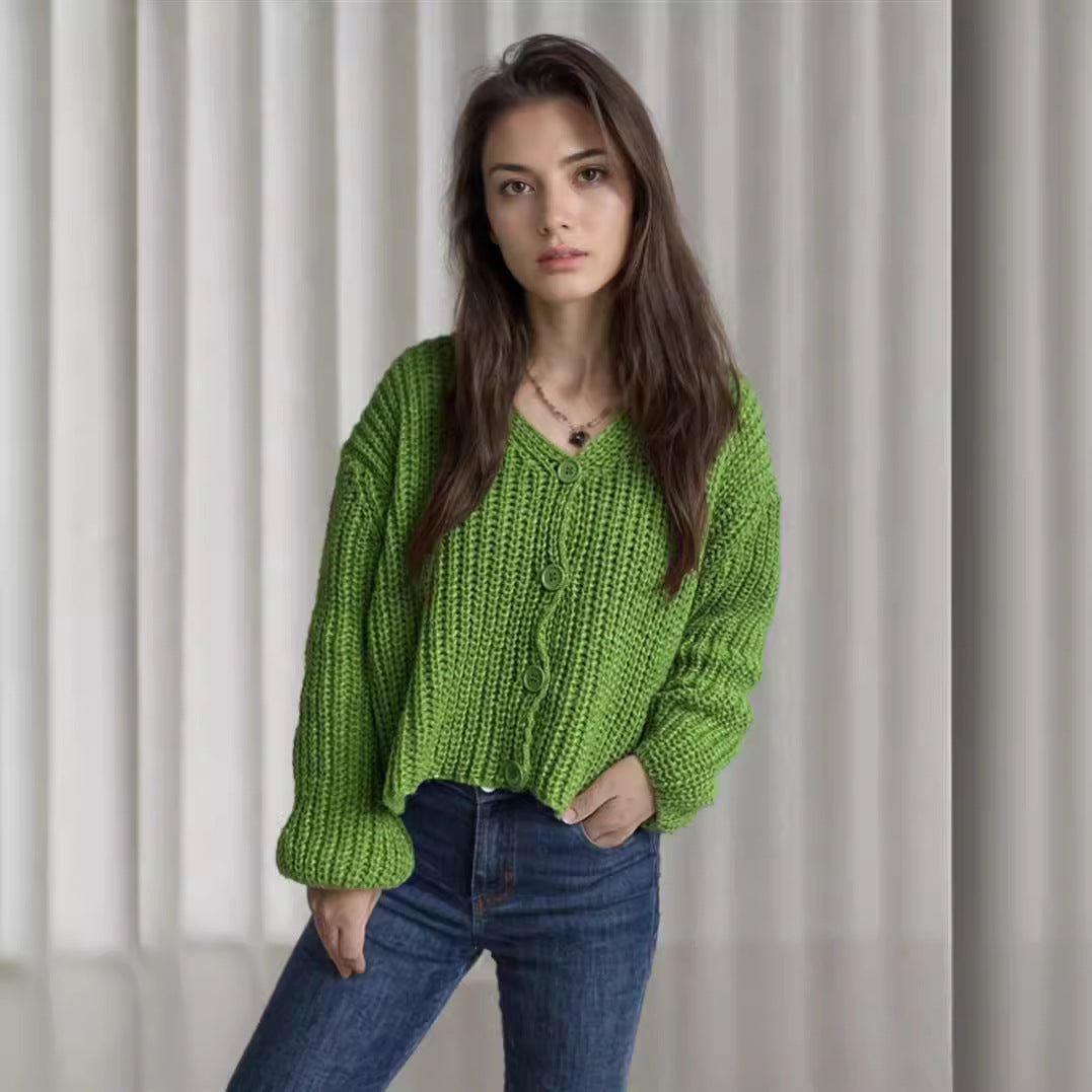 Damska bluza z grubego swetra z modnymi detalami guzików i luźnym krojem Eloura-Moda