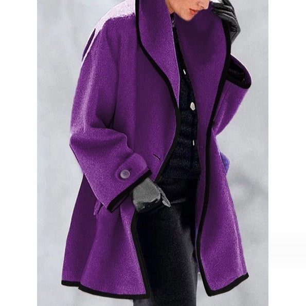 Stylish coat with contrasting piping