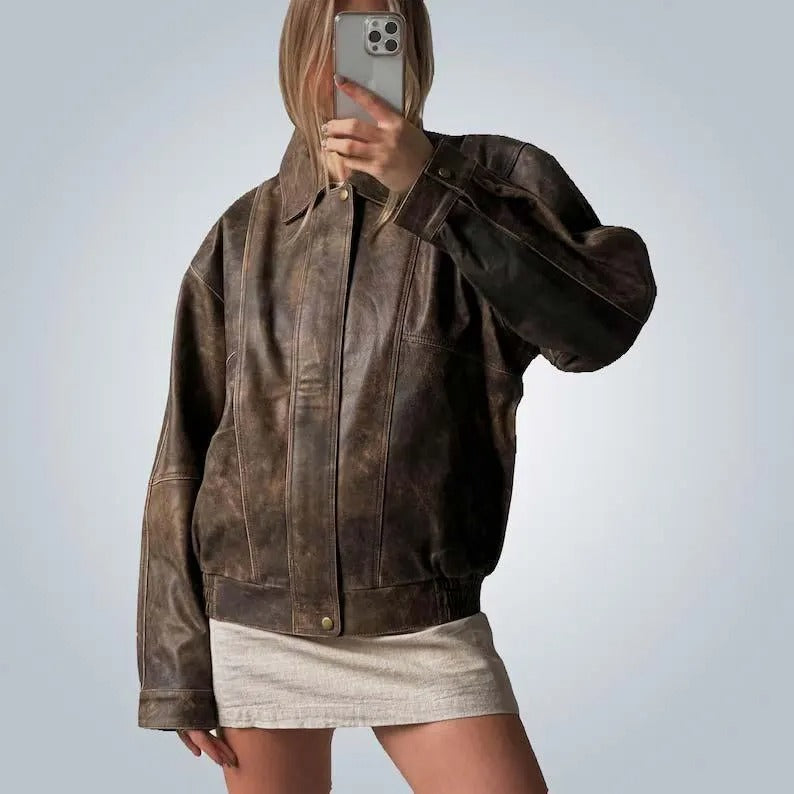 Oversized brown leather jacket with abrasions