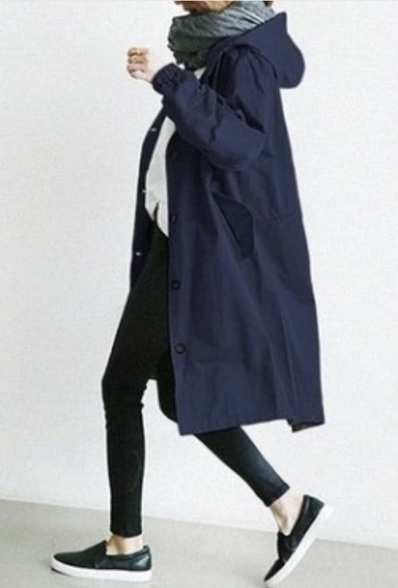 Women's coat with hood and button closure