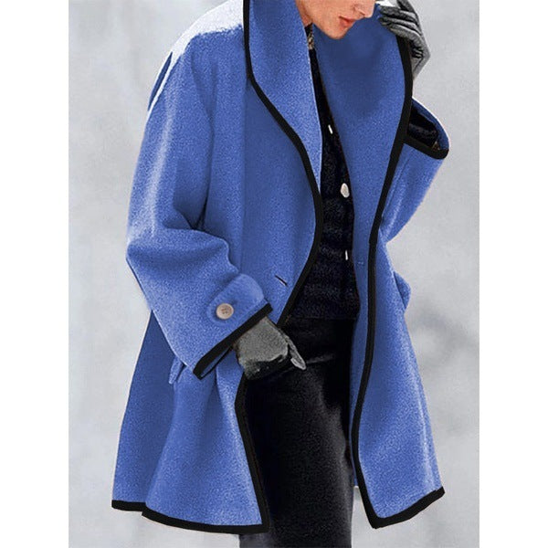 Stylish coat with contrasting piping