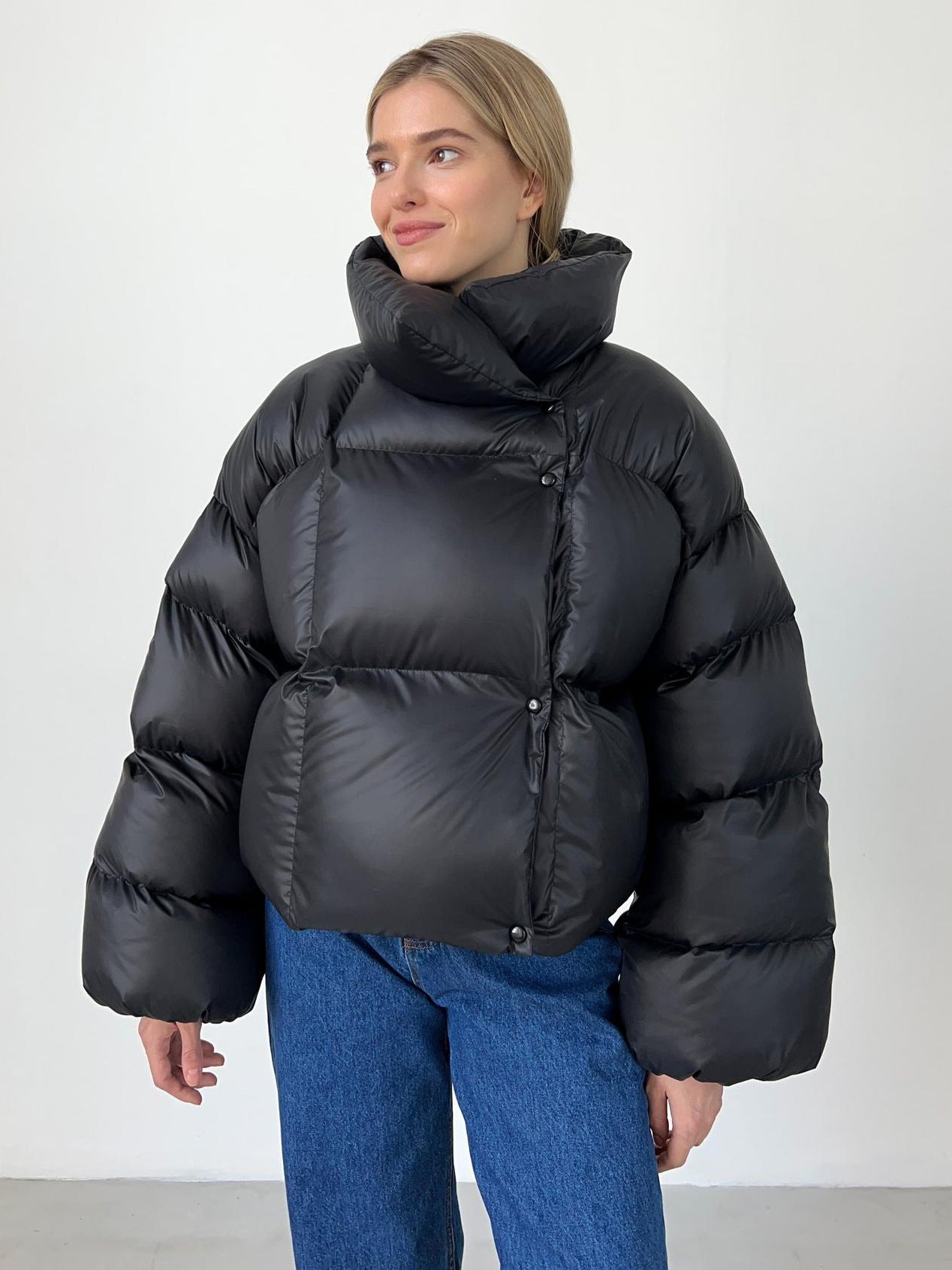 Winter quilted jacket with a large hood