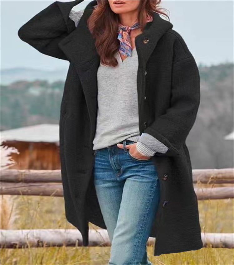 Women's oversized wool coat with a practical button closure Eloura-Moda
