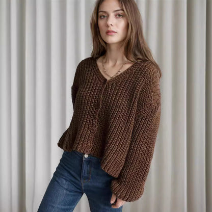 Damska bluza z grubego swetra z modnymi detalami guzików i luźnym krojem Eloura-Moda
