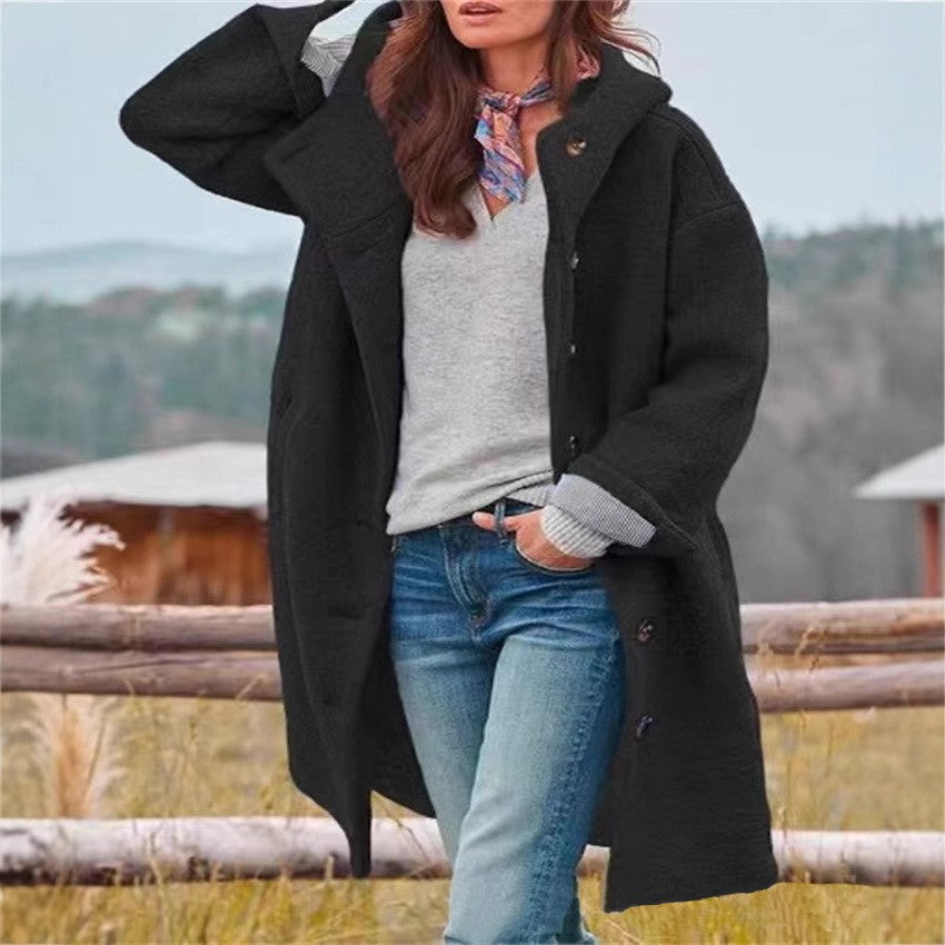 Women's oversized wool coat with a practical button closure Eloura-Moda