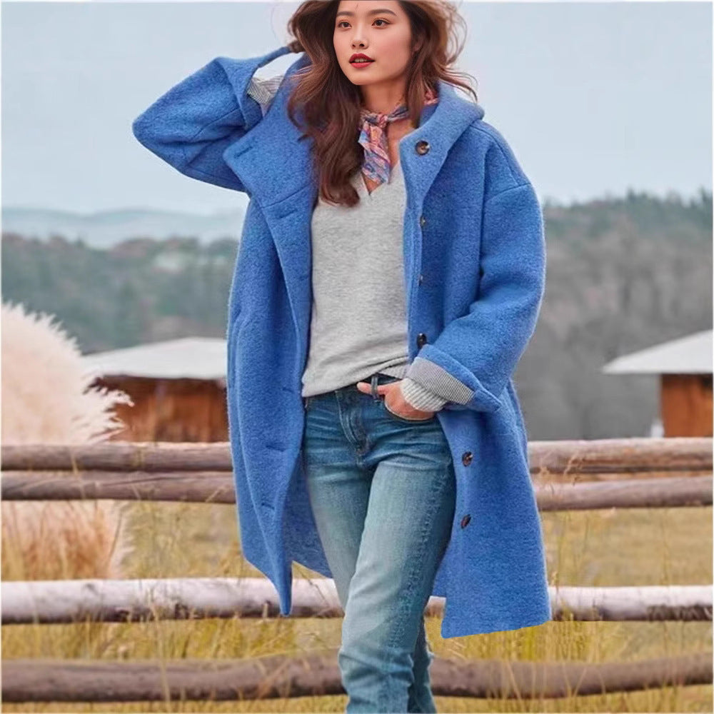 Women's oversized wool coat with a practical button closure Eloura-Moda