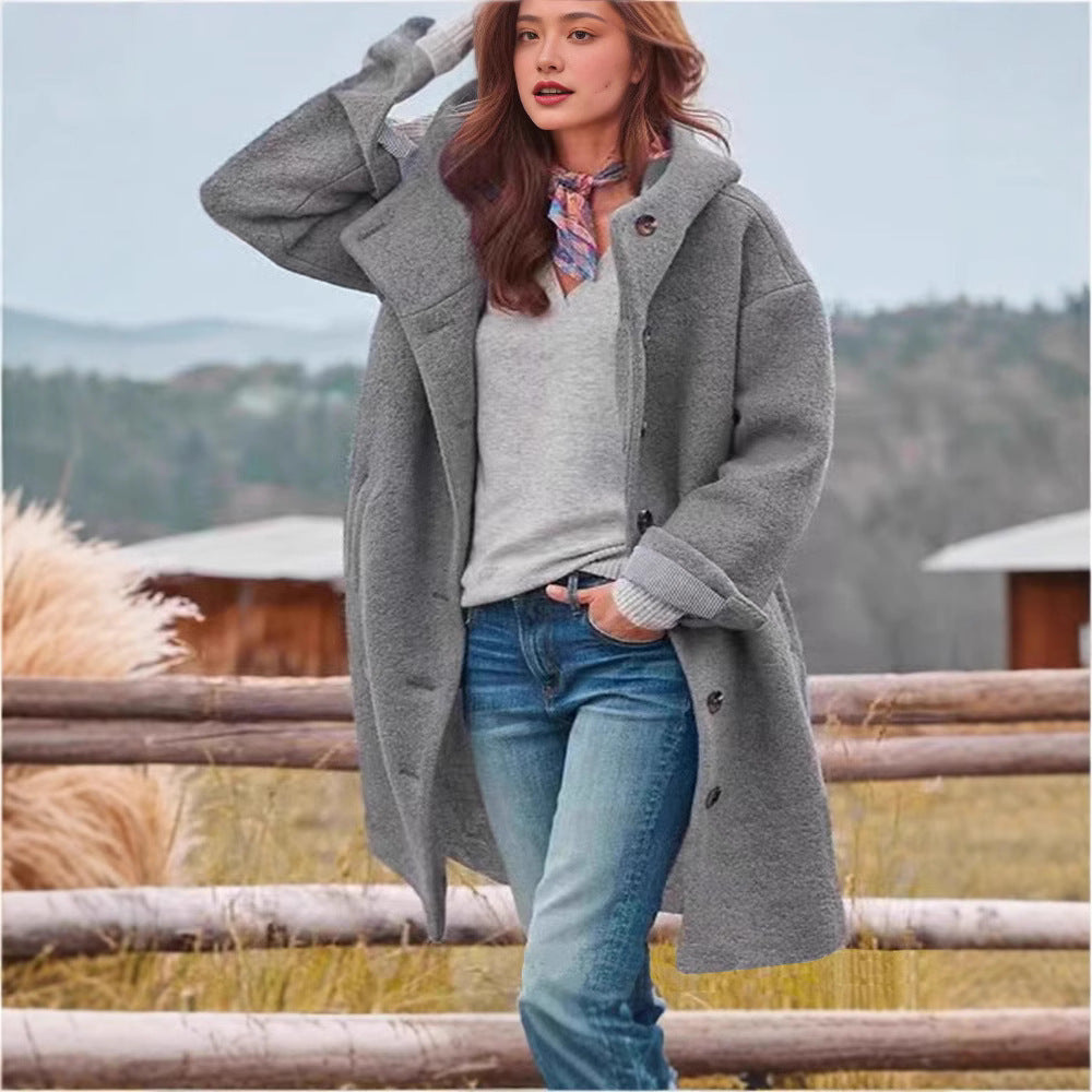 Women's oversized wool coat with a practical button closure Eloura-Moda