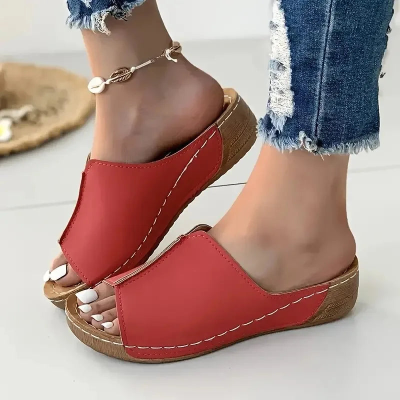 Red wedge sandals in a casual style