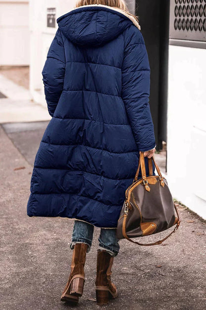 Long quilted jacket with sheepskin lining and hood – Winter essential