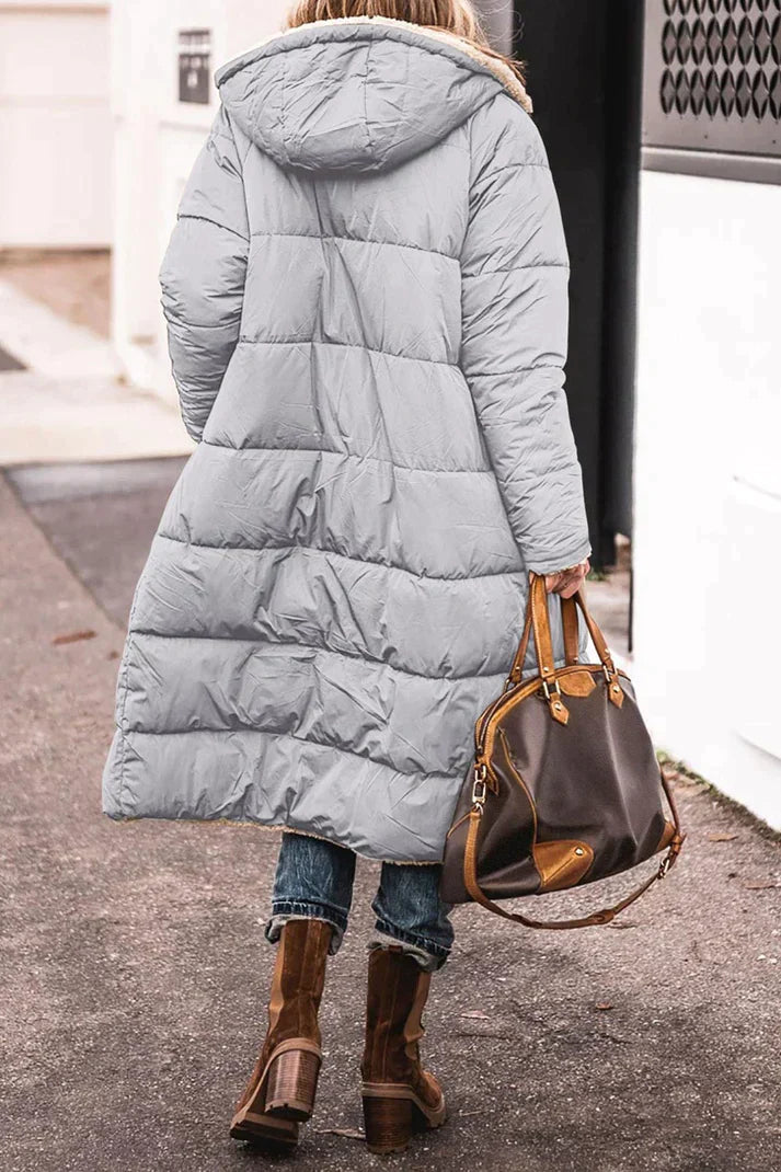 Long quilted jacket with sheepskin lining and hood – Winter essential