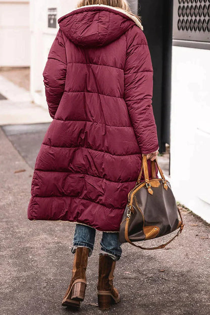 Long quilted jacket with sheepskin lining and hood – Winter essential