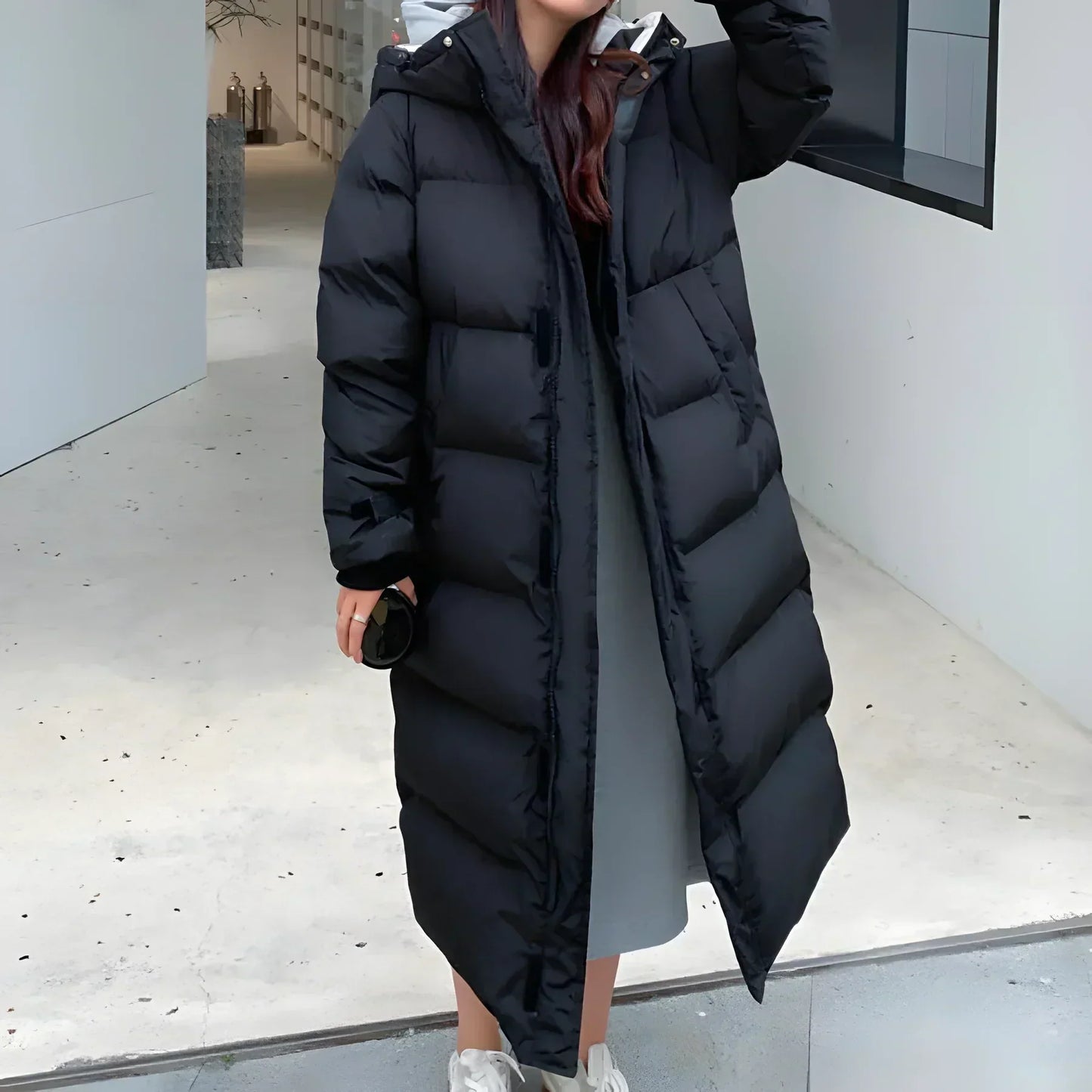Long quilted jacket with hood and thick insulation
