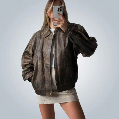 Oversized brown leather jacket with abrasions
