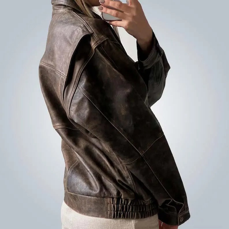 Oversized brown leather jacket with abrasions