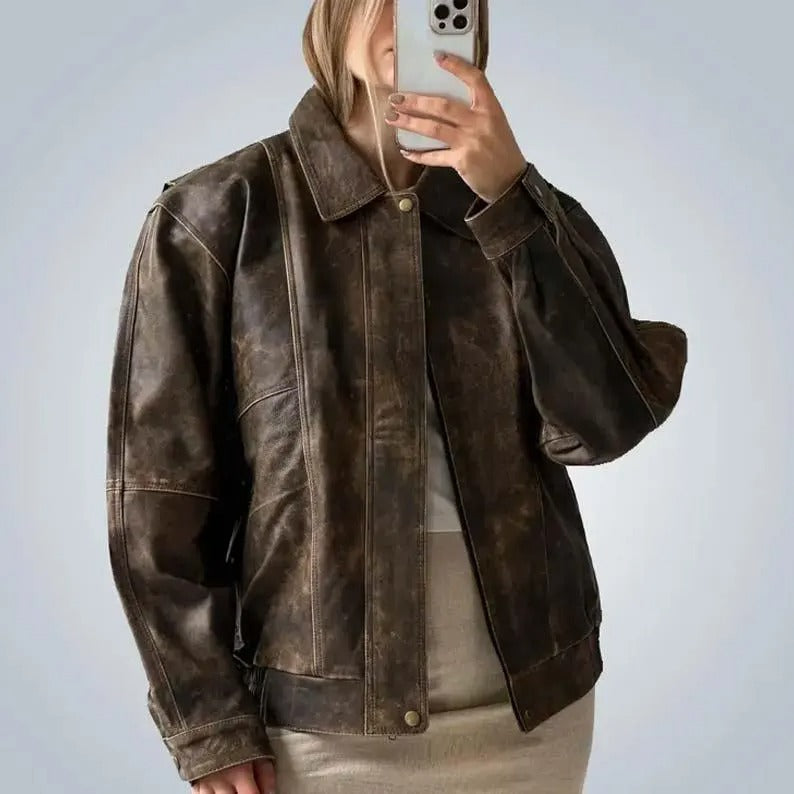 Oversized brown leather jacket with abrasions