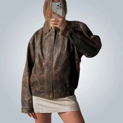 Oversized brown leather jacket with abrasions