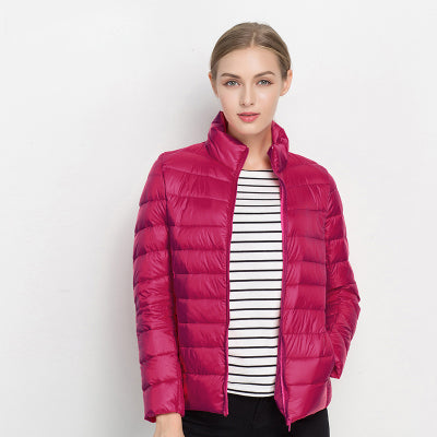 Light quilted jacket in navy color with a high collar